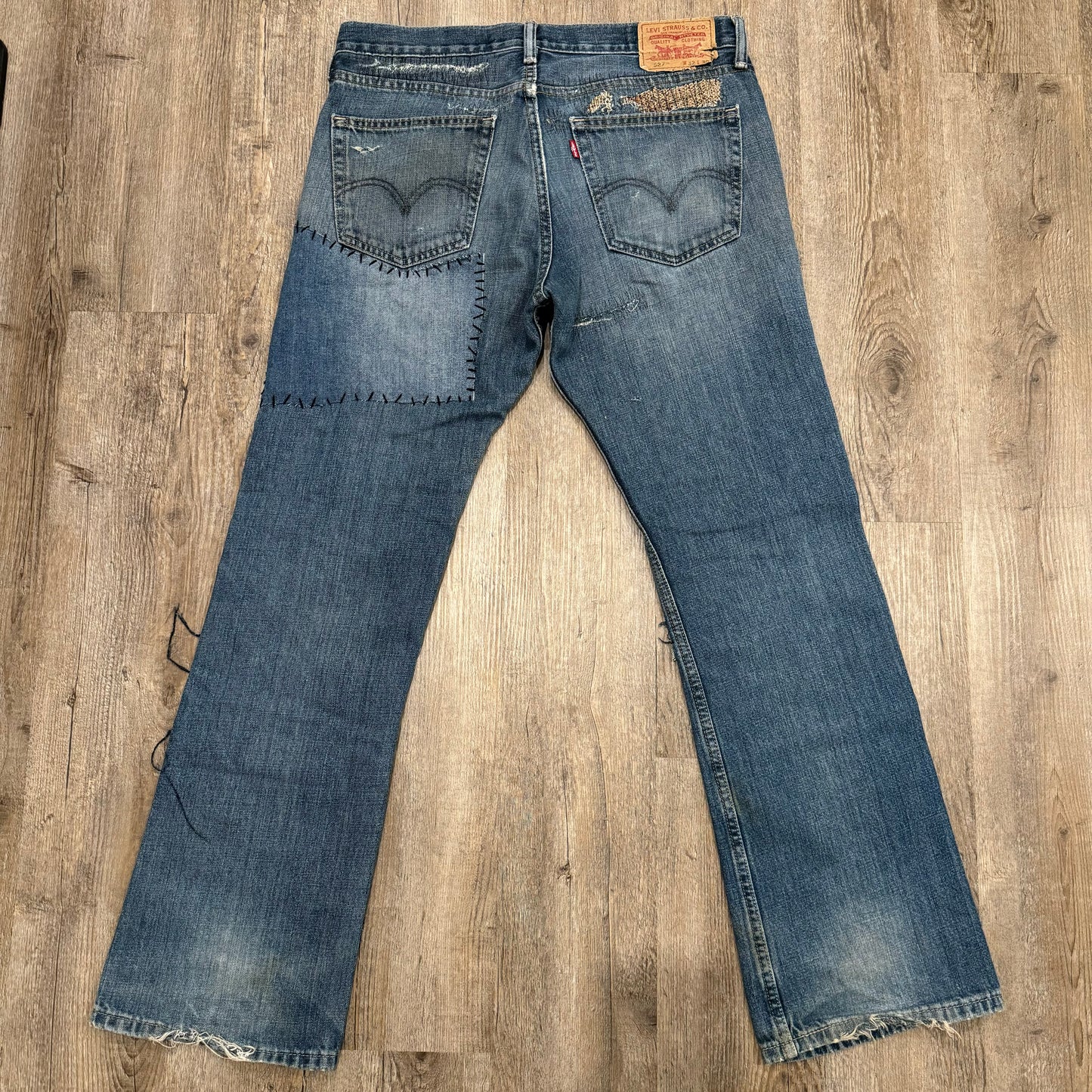 1/1 DENIM PUMPKIN KING BOOTCUT LEVI’S - 34x30