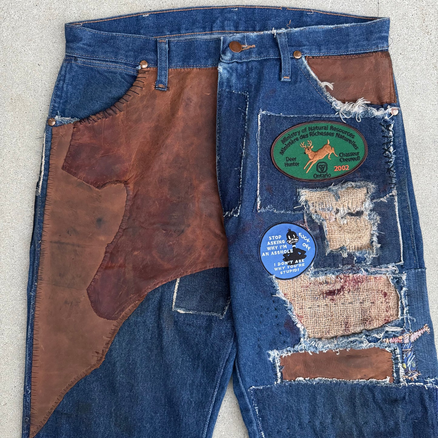 1/1 DENIM PATCHWORK COWBOYCUT WRANGLERS 32x33